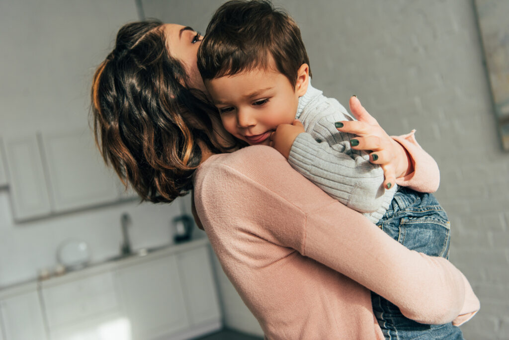 Mom holding her son