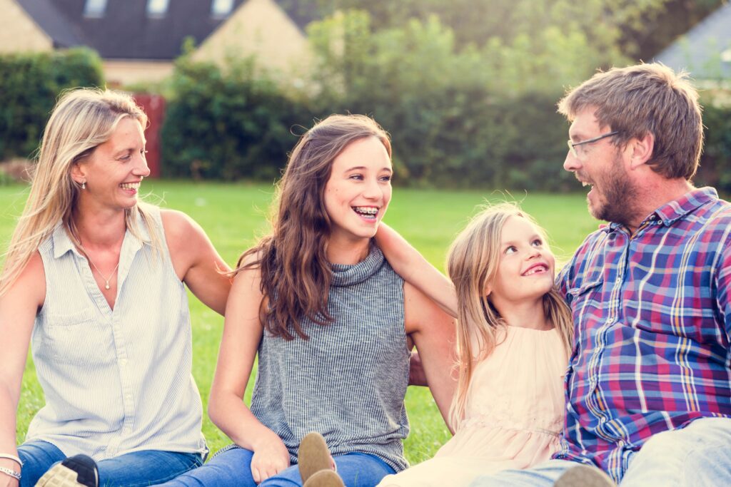 dad-and-family-min chiropractic-care-secret-energizing-stressed-dads