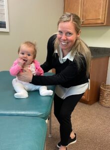 dr pichette with smiling baby Dr pichette with smiling baby